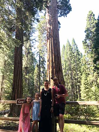 Russell and family underneath the general grand tree